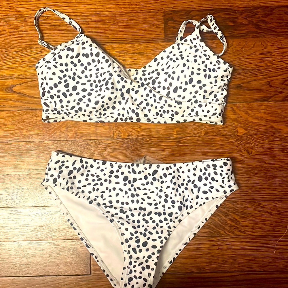 this is a shien barely worn baithing suit, the top is more worn the bottoms